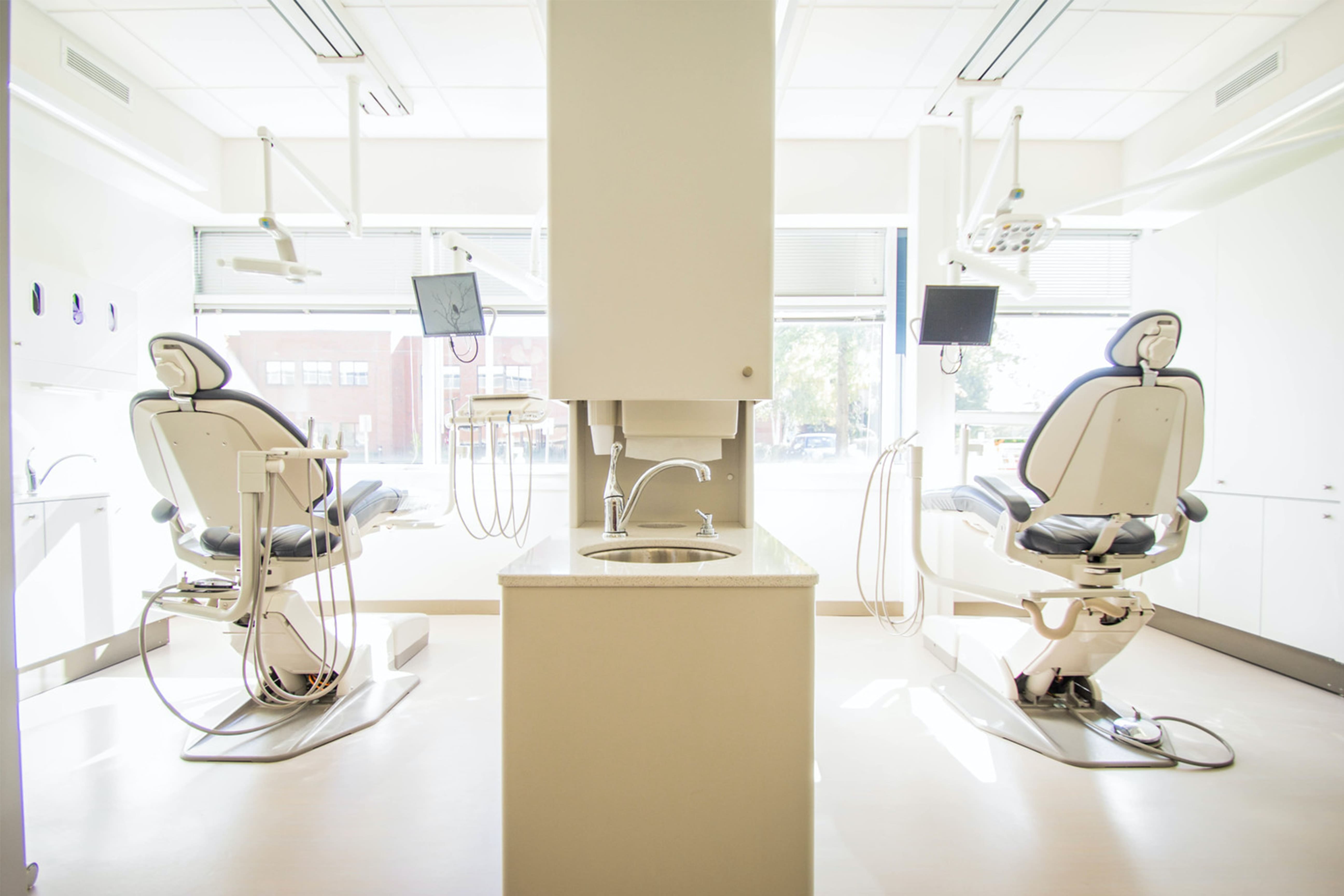 two chairs in a dental office