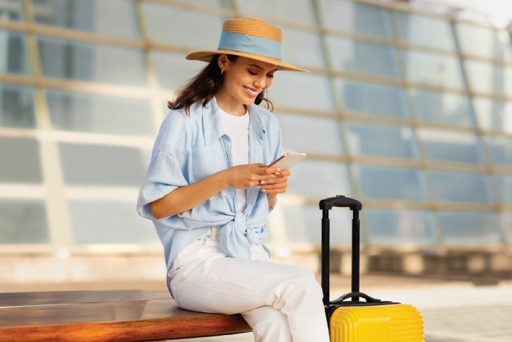 Young woman researching travel insurance